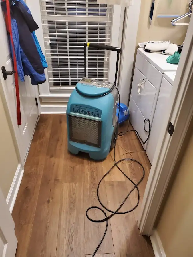 Commercial dehumidifier deployed for Flood Damage Cleanup in Badger